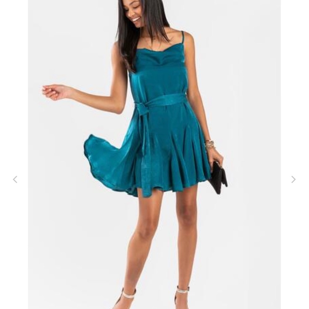 Teen party dress, mini with swirly skirt and spaghetti straps.